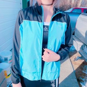 large light blue and black reebok windbreaker